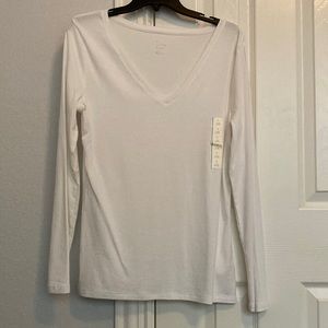 A New Day.  Long sleeved white shirt.